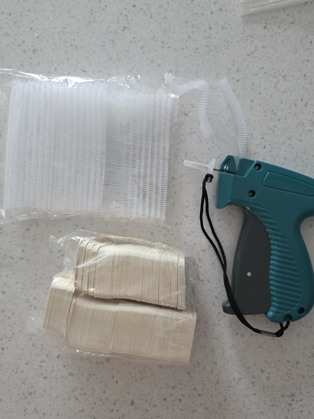 Teal Tagging Gun with White Price Tags - Home Party Supplies